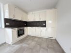 Stadtnahe Erdgeschoss-Wohnung mit Terrasse, Tiefgarage und Aufzug, zentral in Borken - Küche
