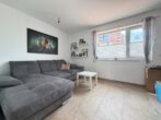 Vermietung -Doppelhaushälfte mit Terrasse und Garten in ruhiger, zentraler Lage von Raesfeld - Wohnzimmer
