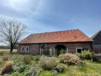 Exklusives Wohnen im EG! Landhaus mit Nebengebäude und Ländereien im Außenbereich von Havixbeck - Gartenansicht