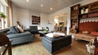 Gepflegtes 4-Zimmer-Reihenendhaus mit Garage, zentrumsnah und ruhig in Borken - Wohnzimmer