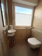 Zweifamilienhaus mit gebildetem Teileigentum, Doppelgarage und Wintergarten in Borken-Marbeck - EG-Gäste WC