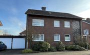 Zweifamilienhaus mit gebildetem Teileigentum, Doppelgarage und Wintergarten in Borken-Marbeck - Ansicht Straße