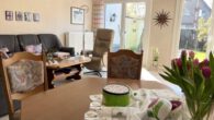 Charmante 3-Zimmer Erdgeschosswohnung mit eigenem Garten, Aufzug und Schwimmbad in Borken - Wohnzimmer