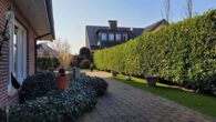 Mit Einliegerwohnung! Großes Einfamilienhaus mit Sommergarten, Doppelgarage, ruhig in Heiden - Garten