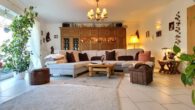 Mit Einliegerwohnung! Großes Einfamilienhaus mit Sommergarten, Doppelgarage, ruhig in Heiden - Wohnzimmer